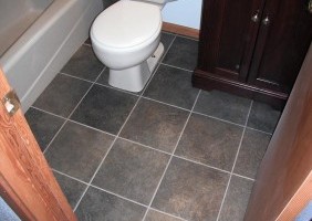 Dark Slate Flooring Bathroom Remodel