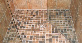Custom Travertine Shower w/ Smaller Tiles for Flooring
